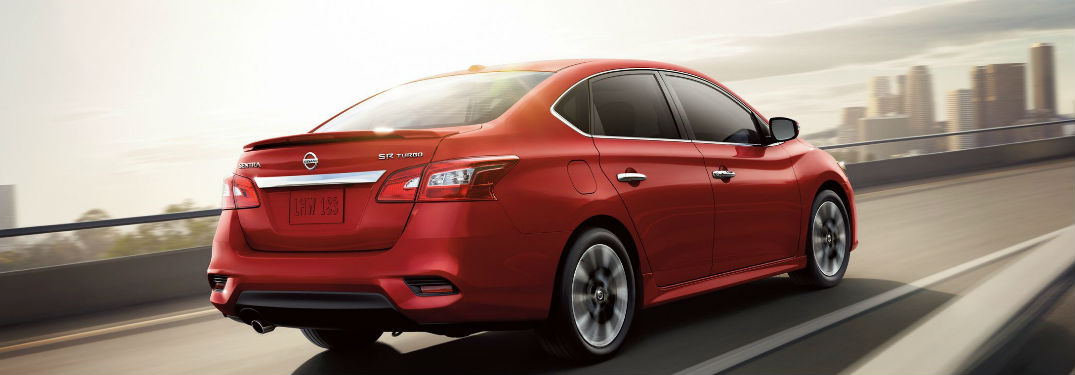 Nissan Sentra driving on a road