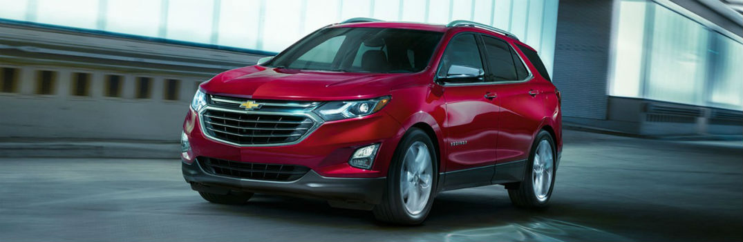 Chevy Equinox driving on a road